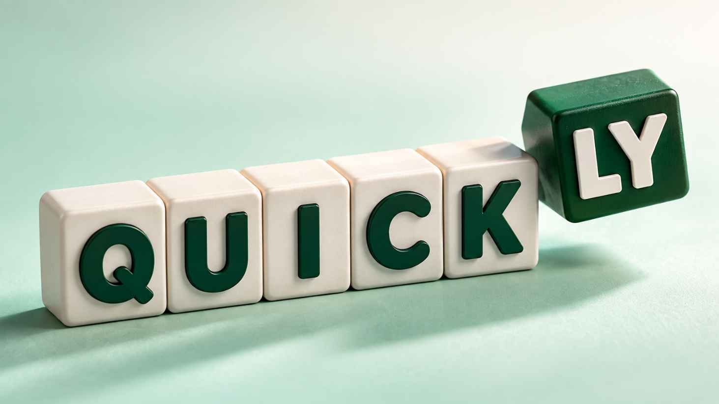 Off white letter blocks spelling QUICK on a mint surface with a forest green LY block hovering above about to attach.